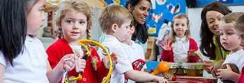 Image of toddlers with musical instruments