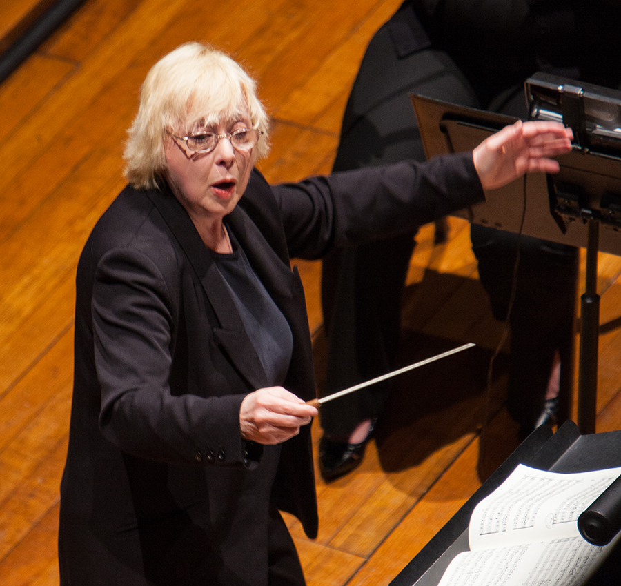 Photo of Joanna Goldstein conducting the IUS Orchestra