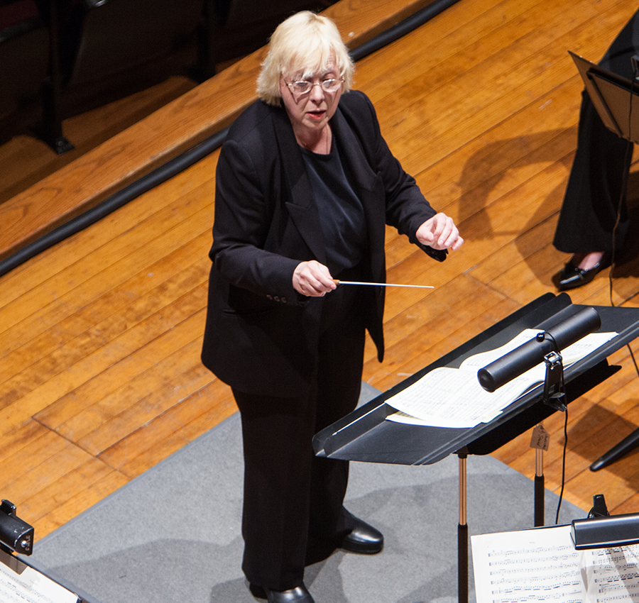 Photo of Joanna Goldstein conducting the IUS Orchestra